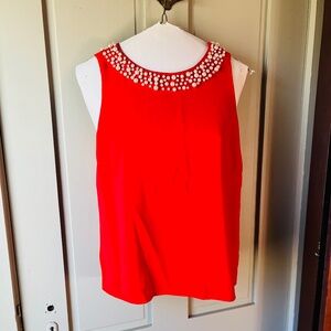 Bright red Ann Taylor lined sleeveless shirt with pearl embellishment